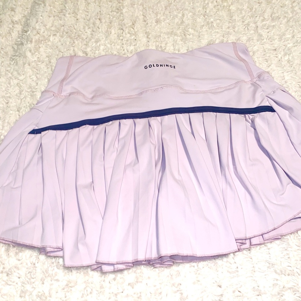 Gold hinge skirt! Size medium. Never been worn.